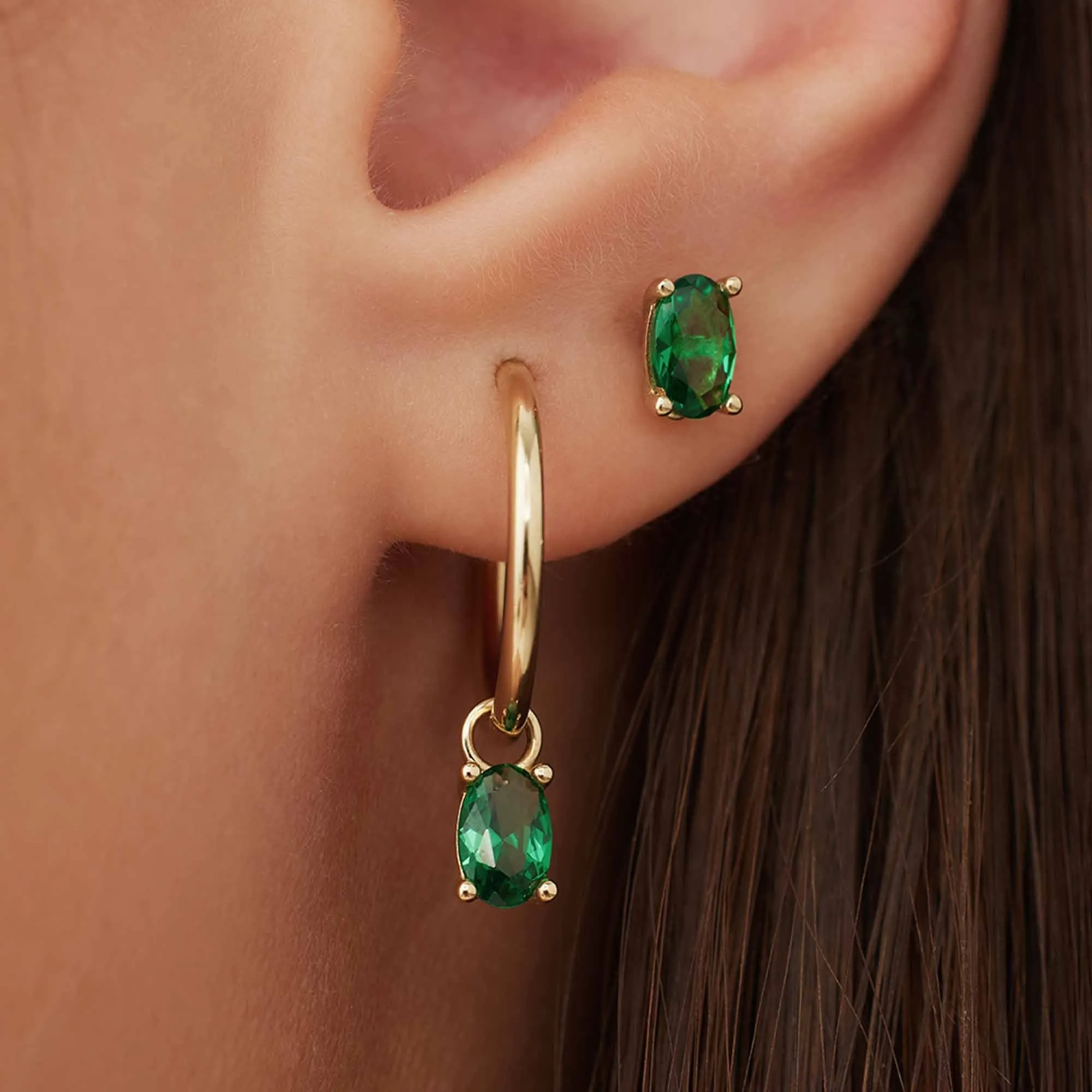 Baguette Olivia 14 karat gold hoop earrings with green zirconia stone