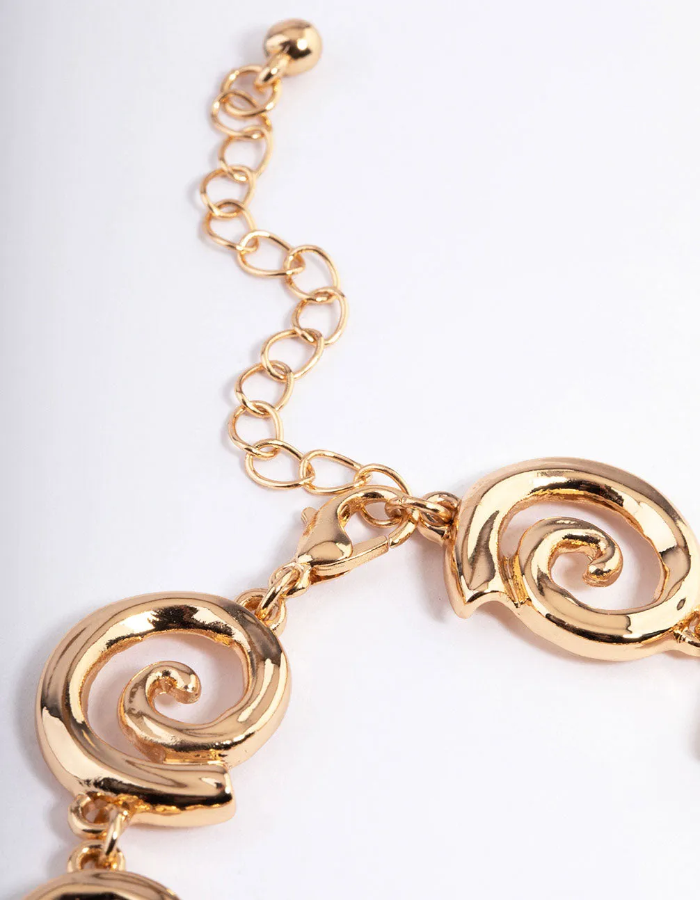 Gold Mixed Size Twirl Bracelet