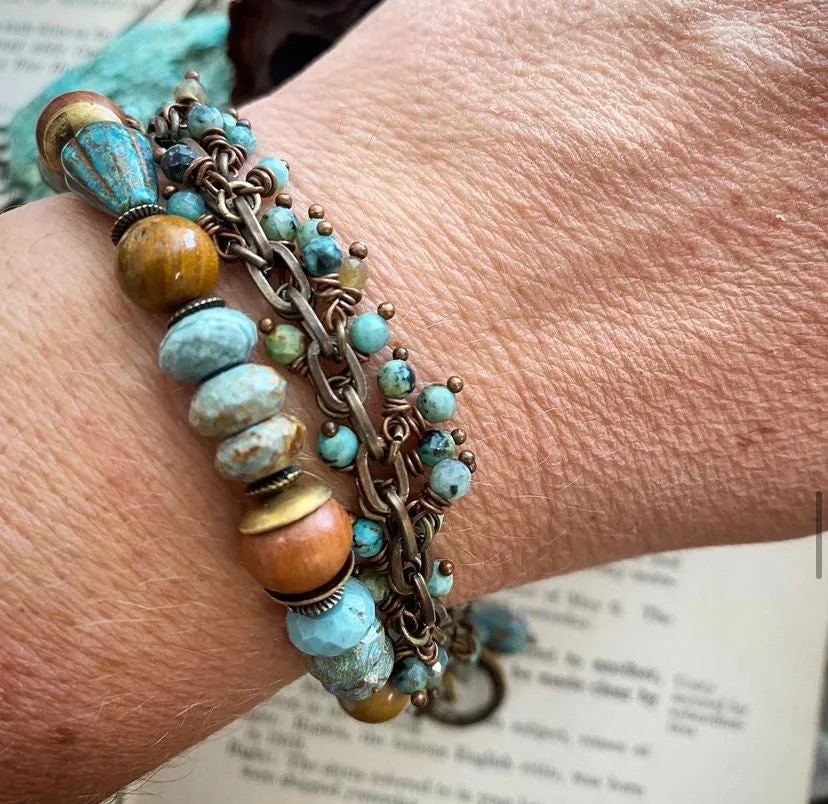 Green turquoise stone, sandalwood, Czech glass, Jasper, and bronze metal wire wrapped bracelet.